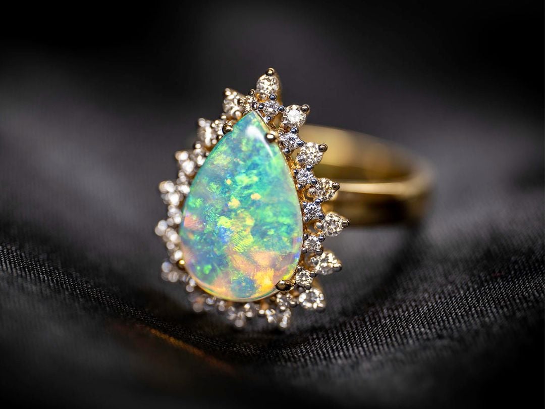 Opal and diamond ring